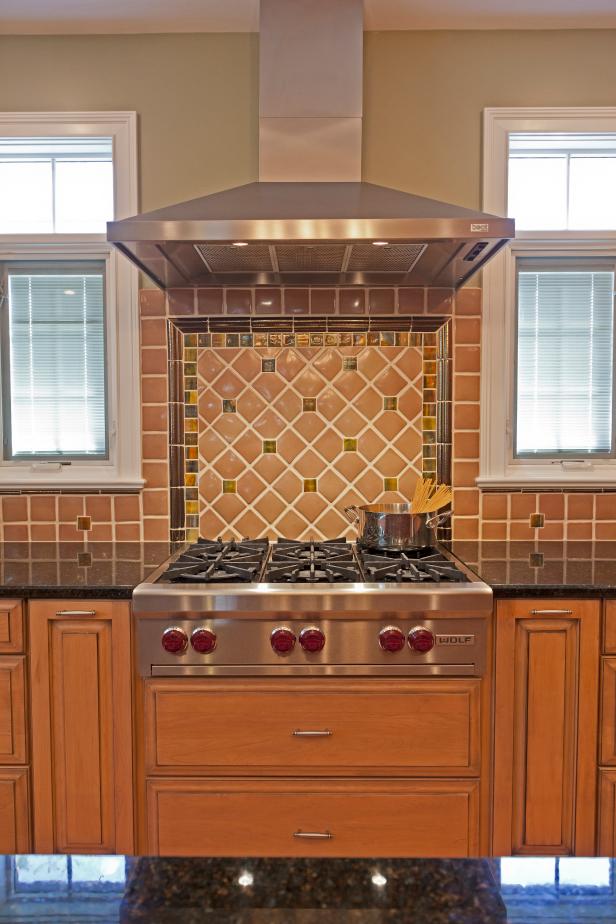 Warm Tile Kitchen Backsplash & Stainless Range Hood HGTV